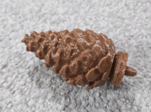 Load image into Gallery viewer, Pine Cone Geocache Hang Container for Tree Hide Top Opening Pinecones