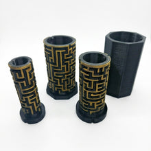 Load image into Gallery viewer, Three black and gold maze puzzle boxes of different sizes with a patterned exterior, displayed on a white background.